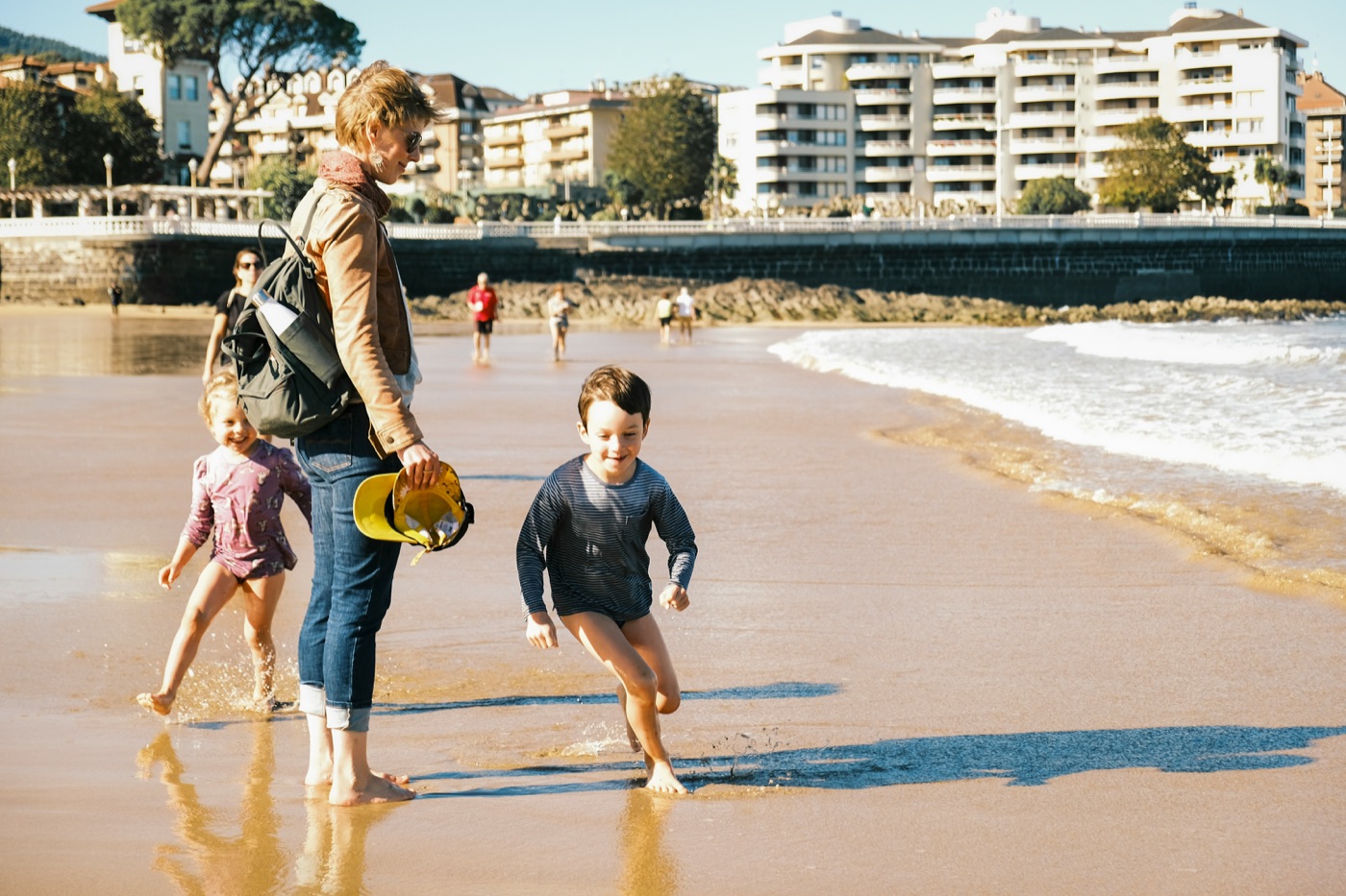 Family playing at the beach